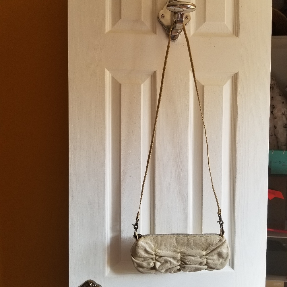 HOBO brand small crossbody purse with scalloped detail. Bone color.